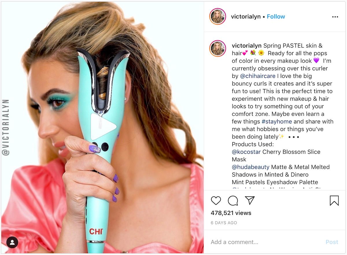 Beauty influencer Victoria Lyn sharing her experience using a hair curler.